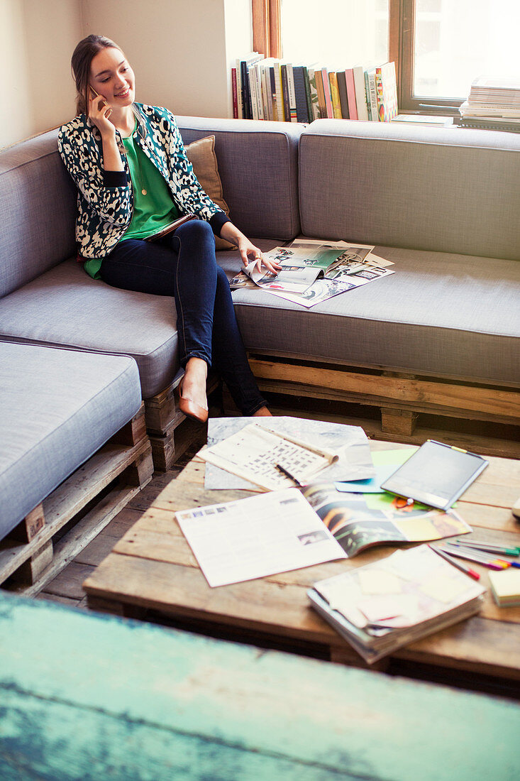 Businesswoman reviewing proofs