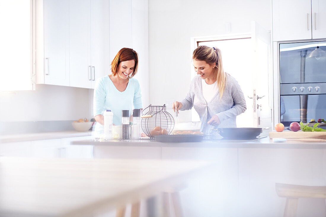 Women baking in kitchen