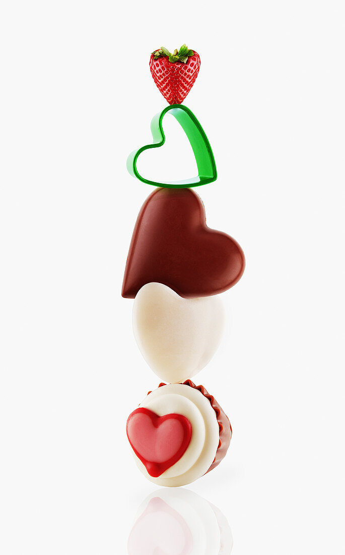 Heart-shaped desserts balancing