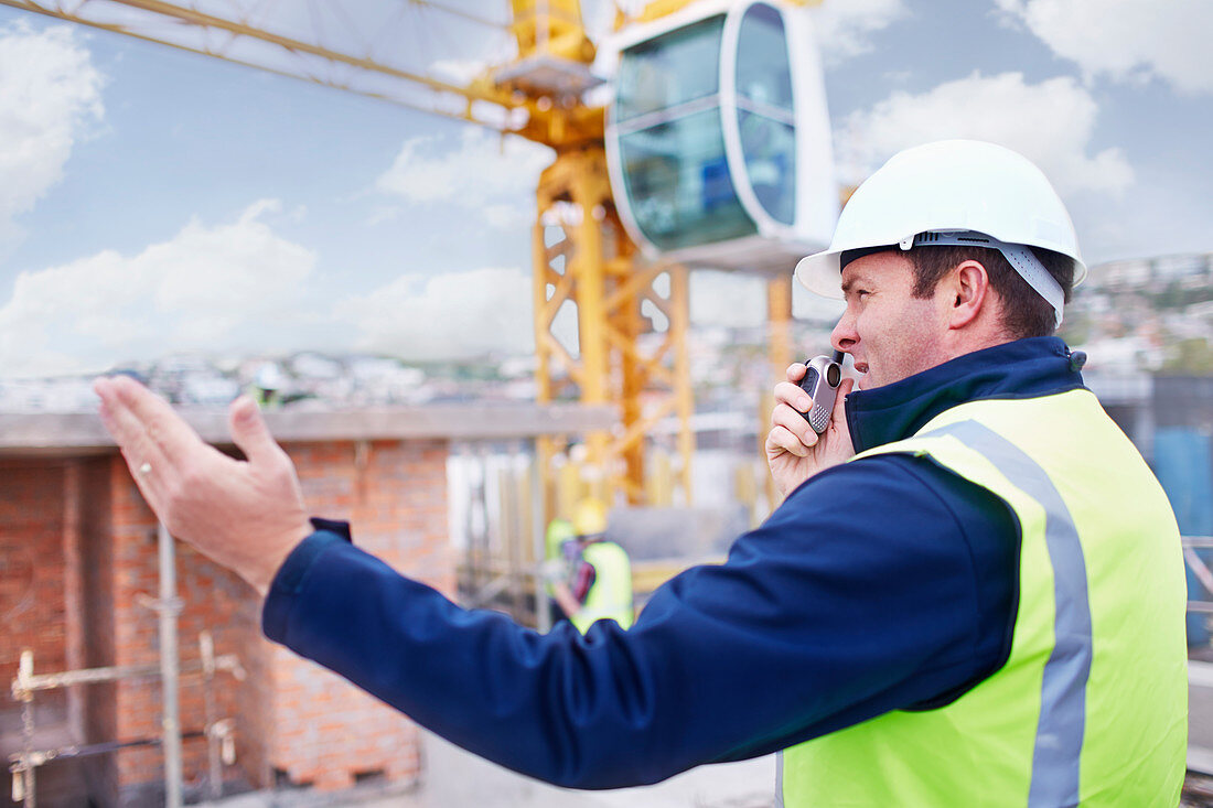 Construction worker with walkie-talkie