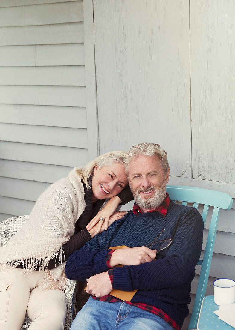 Portrait senior couple hugging