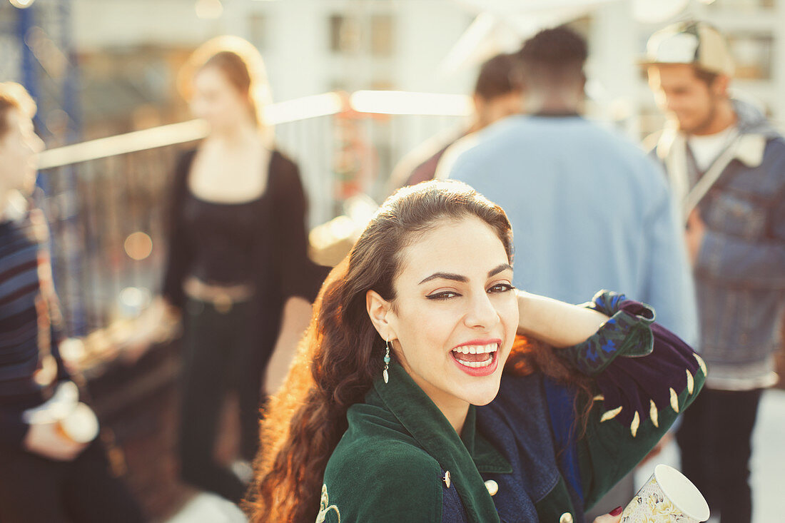 Woman enjoying rooftop party