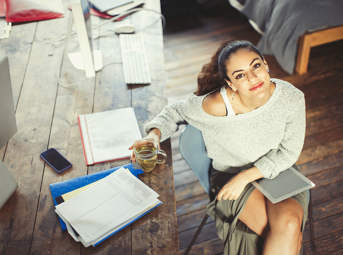 College student studying with tea