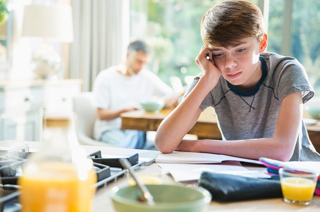 Frustrated boy doing homework