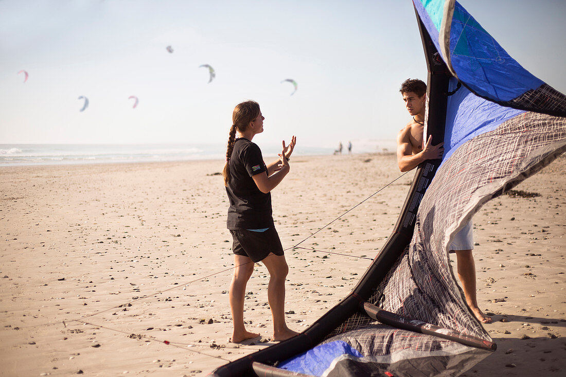 Woman with kiteboarding kite