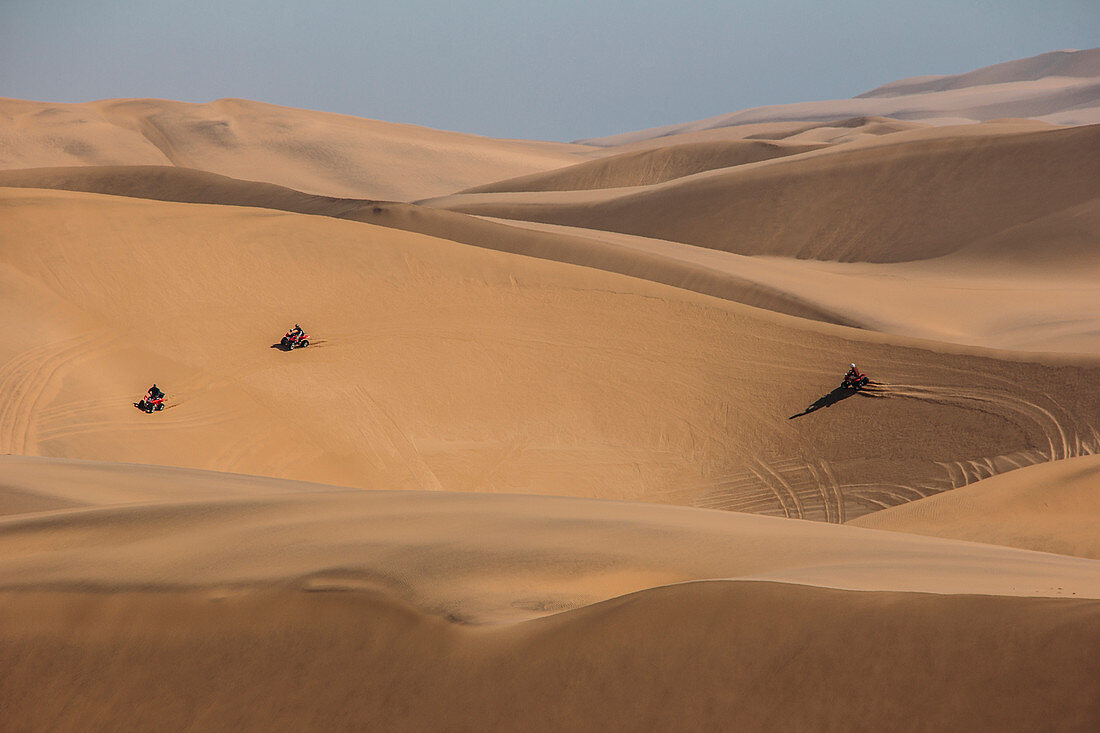 Quadbikes in desert, Namibia