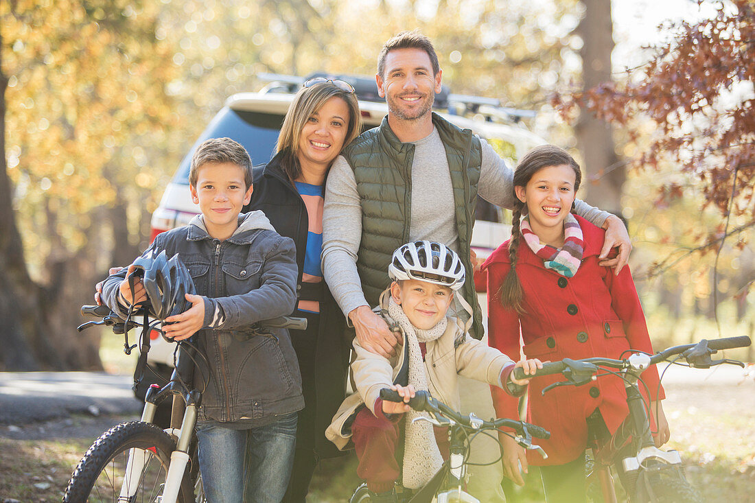 Family with bicycles outdoors