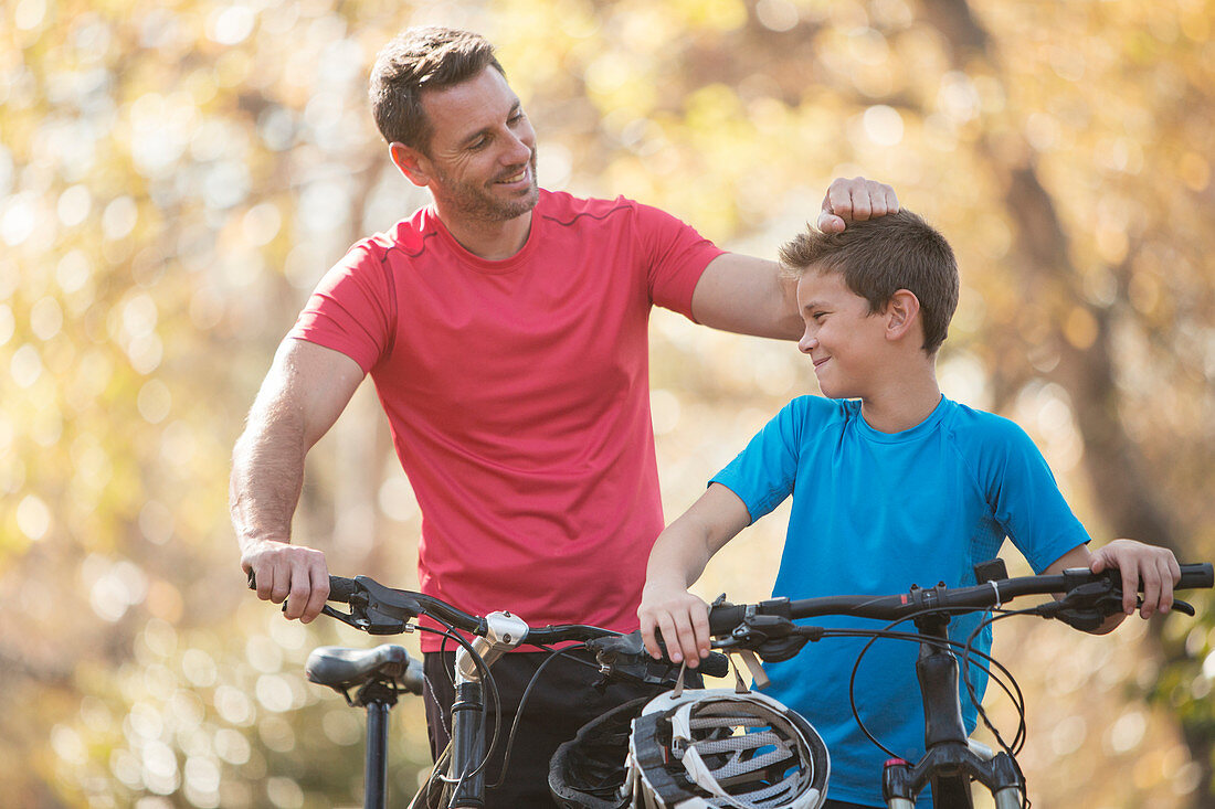 Father and son with mountain bikes