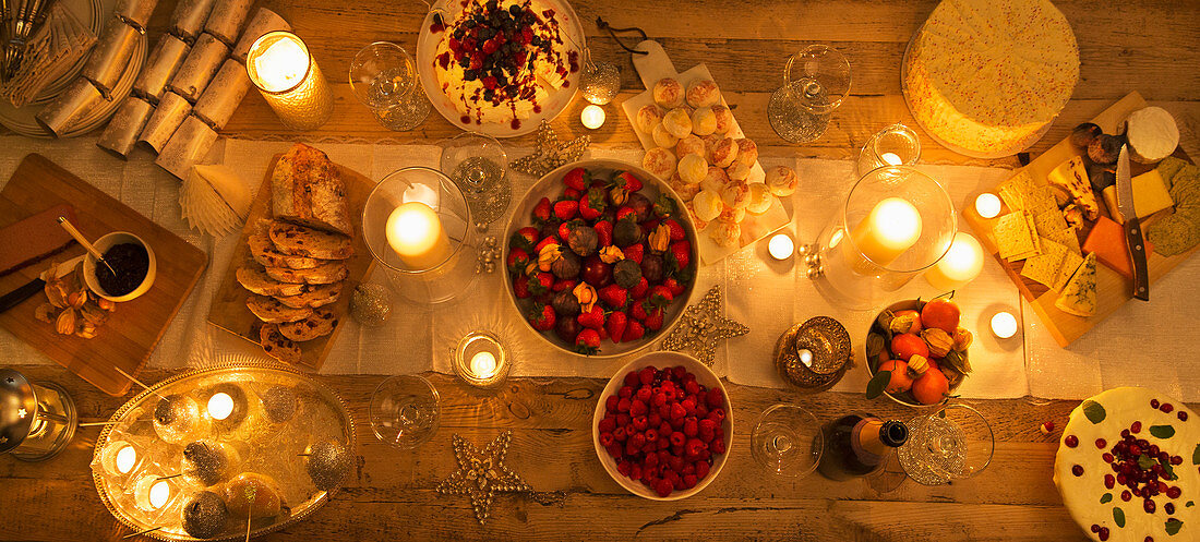 Candlelight table with Christmas desserts