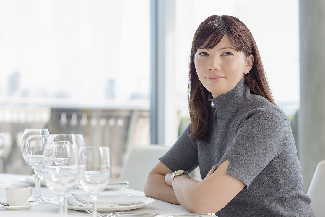 Businesswoman at restaurant table