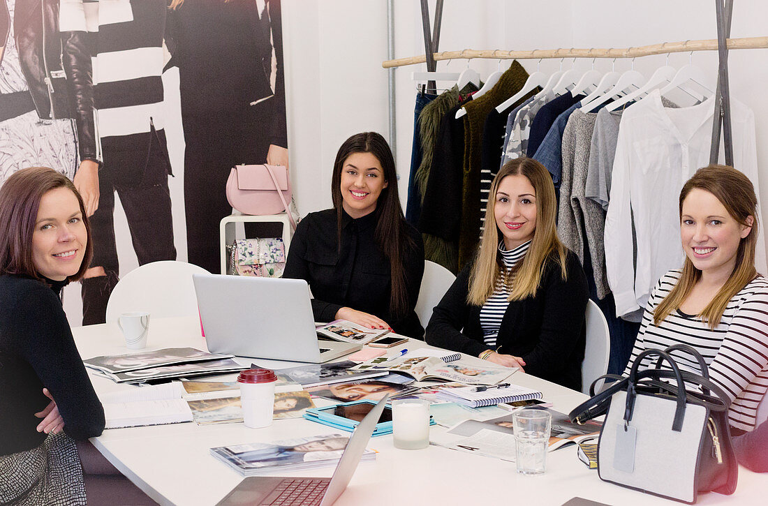 Fashion buyers meeting in messy office