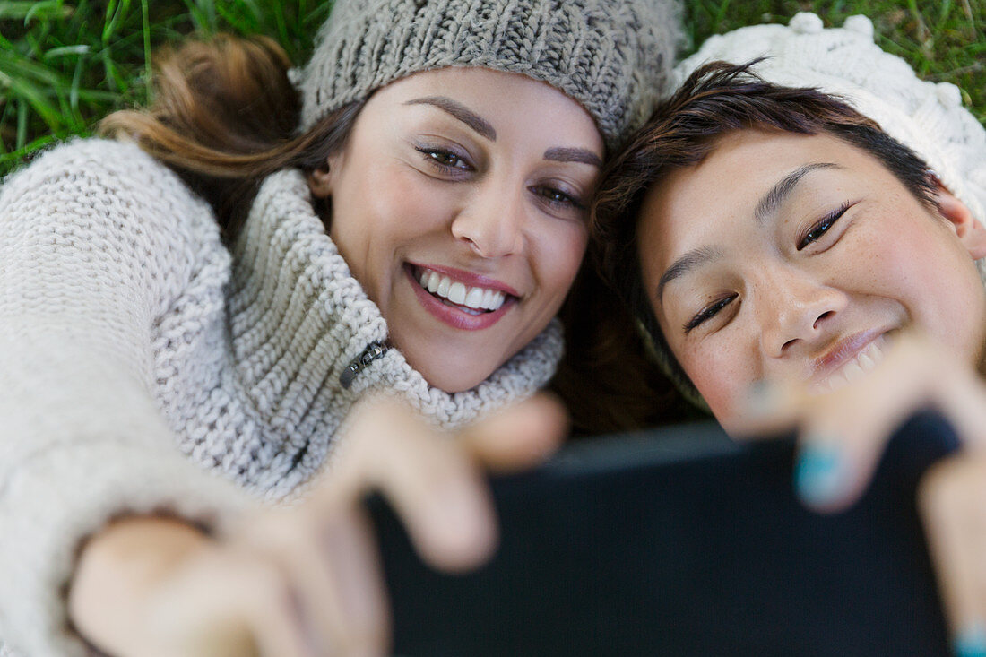 Female friends taking selfie