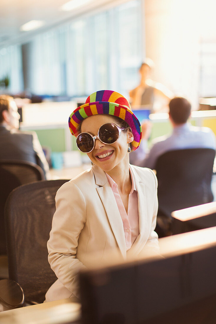 Businesswoman in silly sunglasses