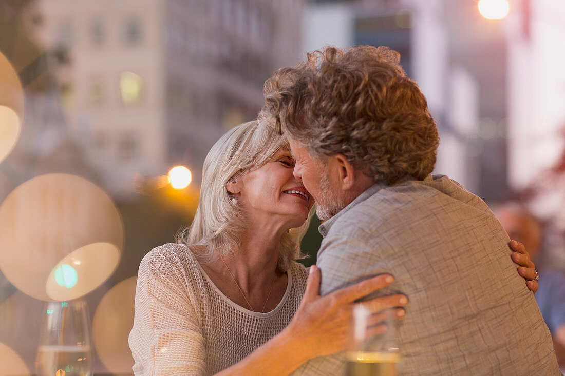 Affectionate senior couple kissing