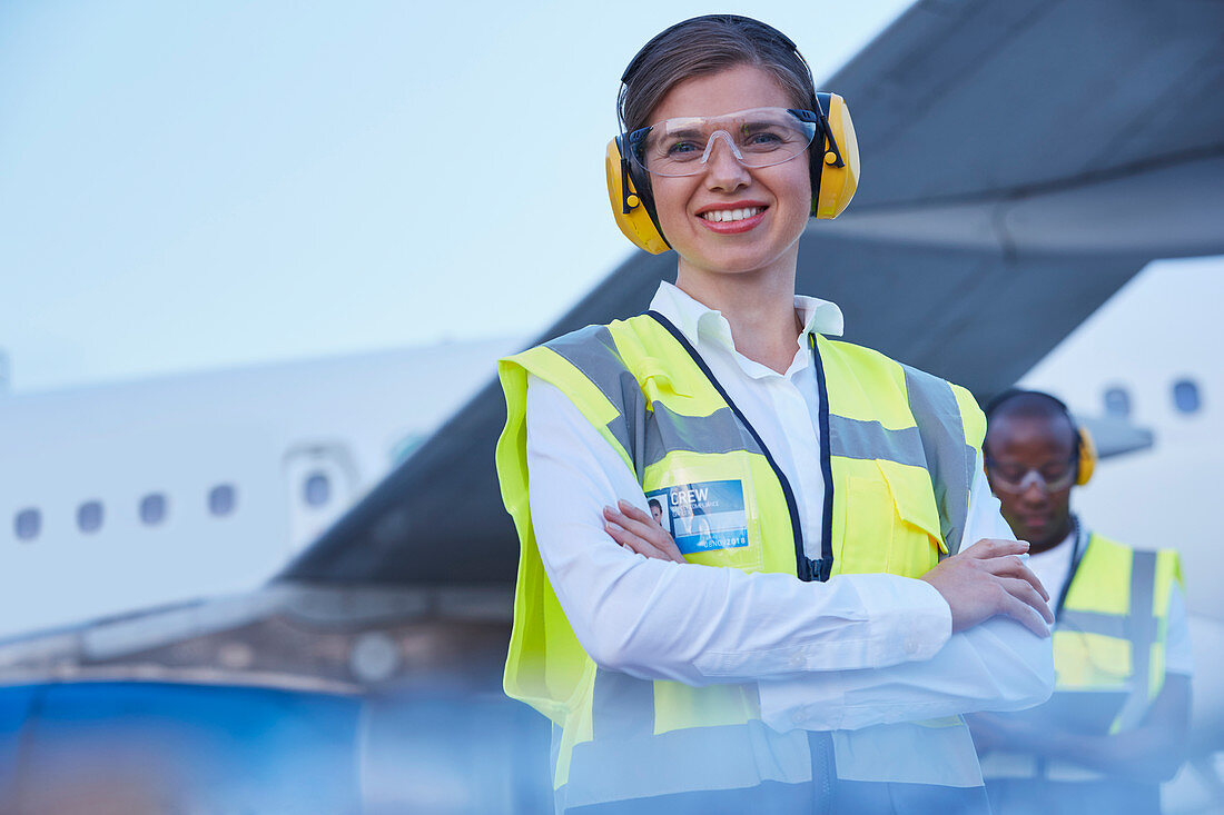 Portrait smiling female air traffic controller