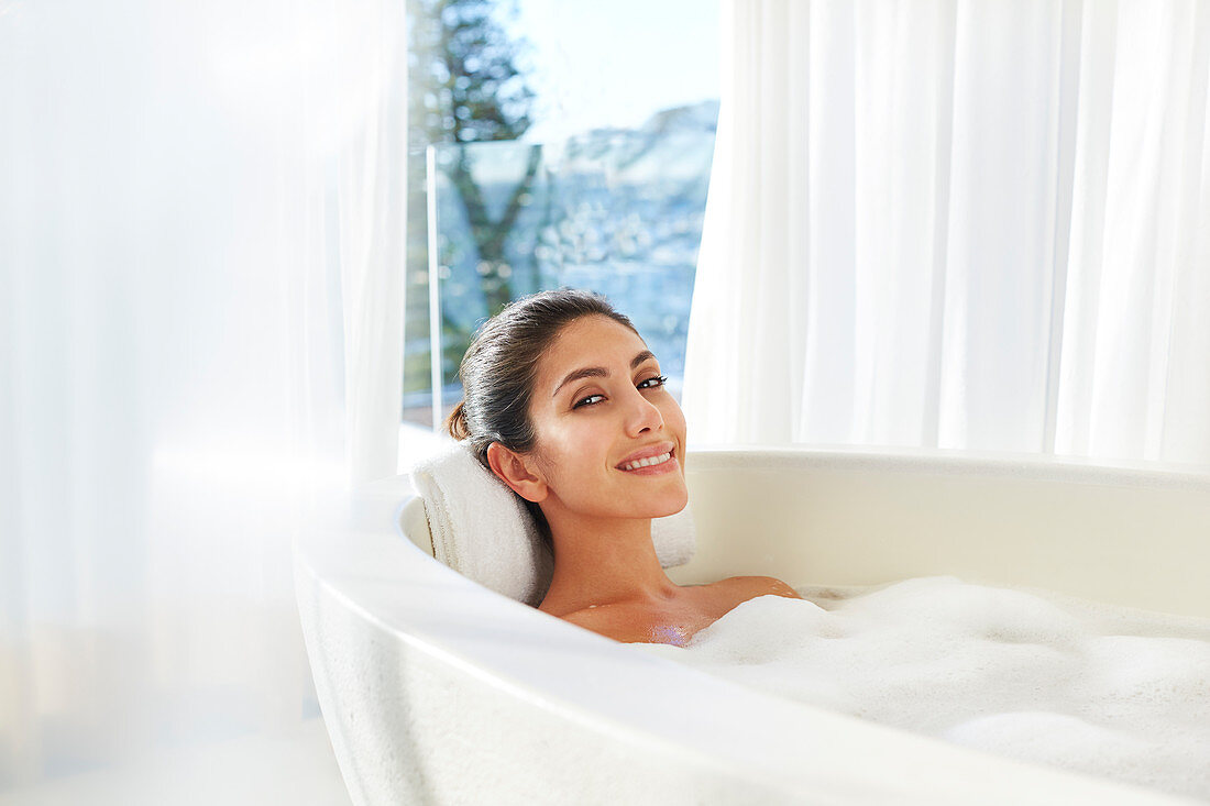 Woman relaxing enjoying bubble bath