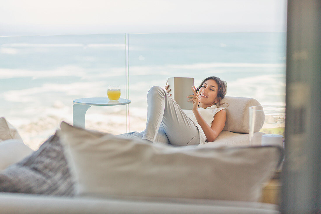 Woman relaxing reading book