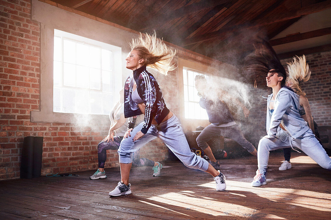 Young women hip hop dancers dancing in studio