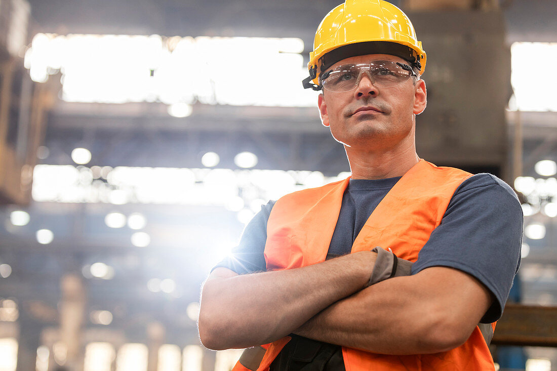 Portrait serious confident steel worker in factory