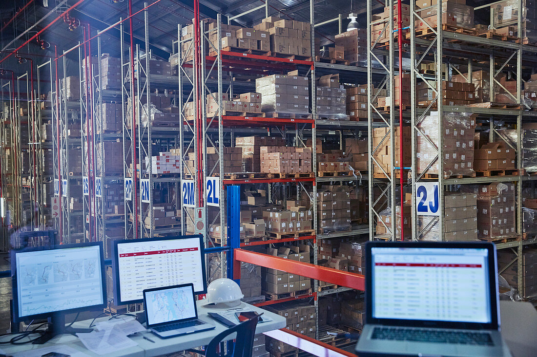 Laptops and computers in distribution warehouse