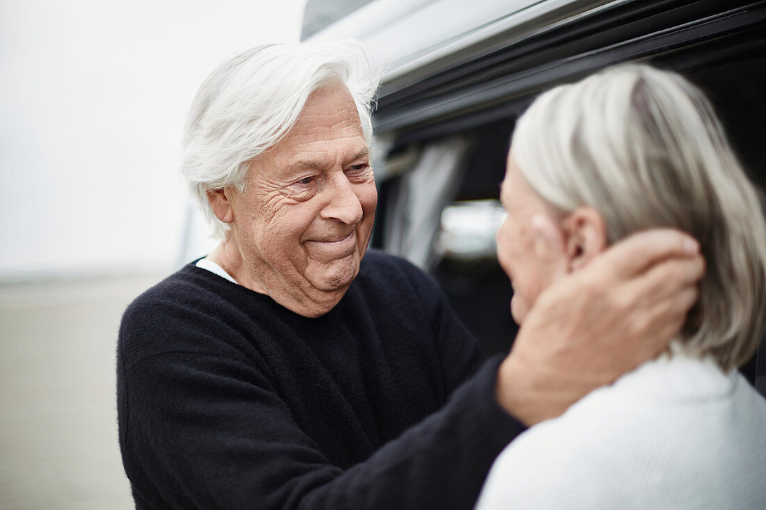 Affectionate senior couple face to face