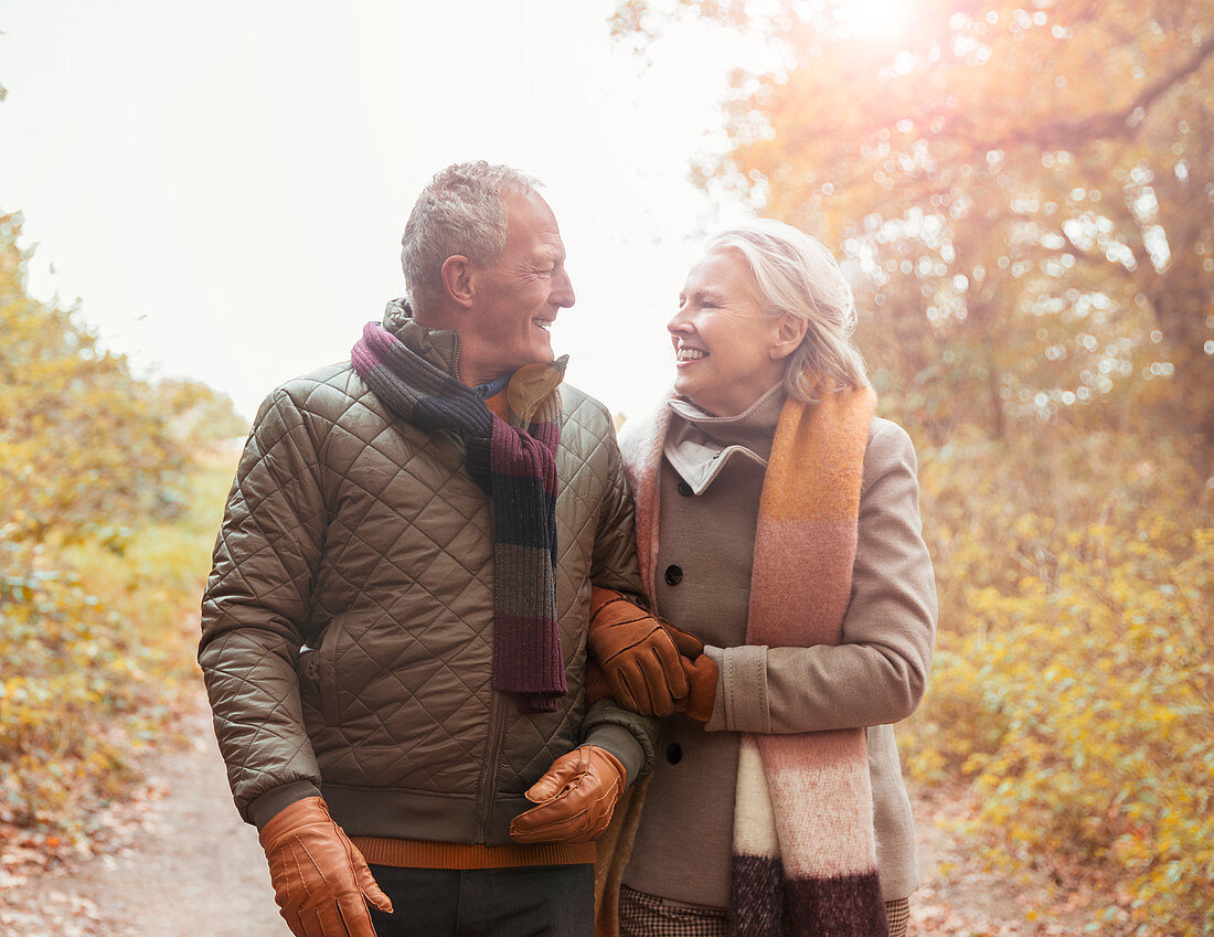 Affectionate senior couple walking