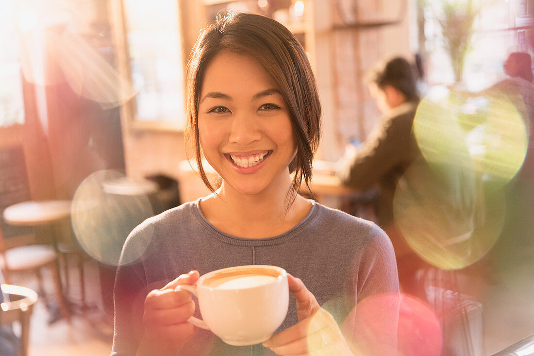 Portrait woman drinking cappuccino
