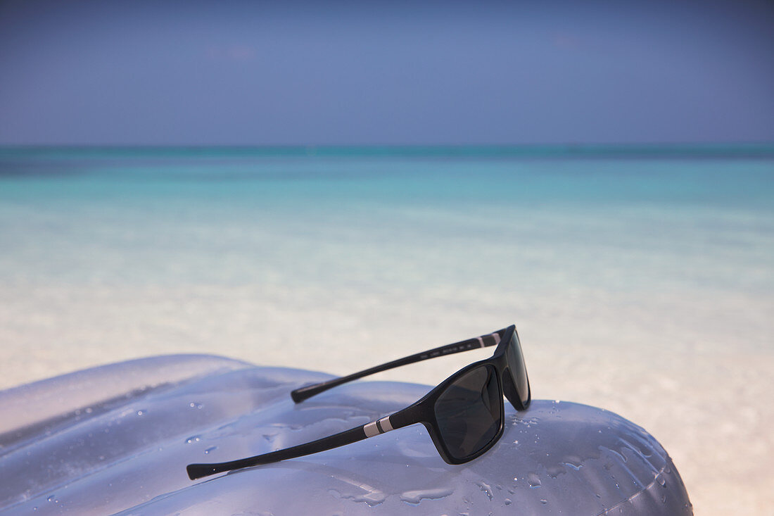 Sunglasses on inflatable raft