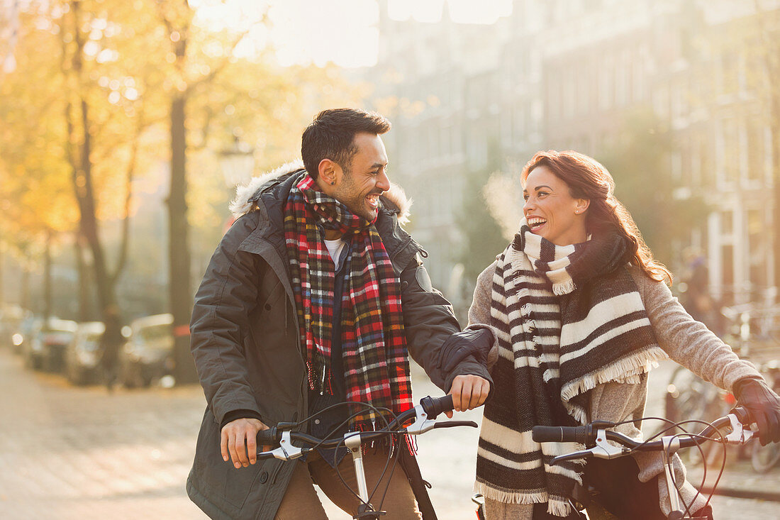 Young couple bike riding