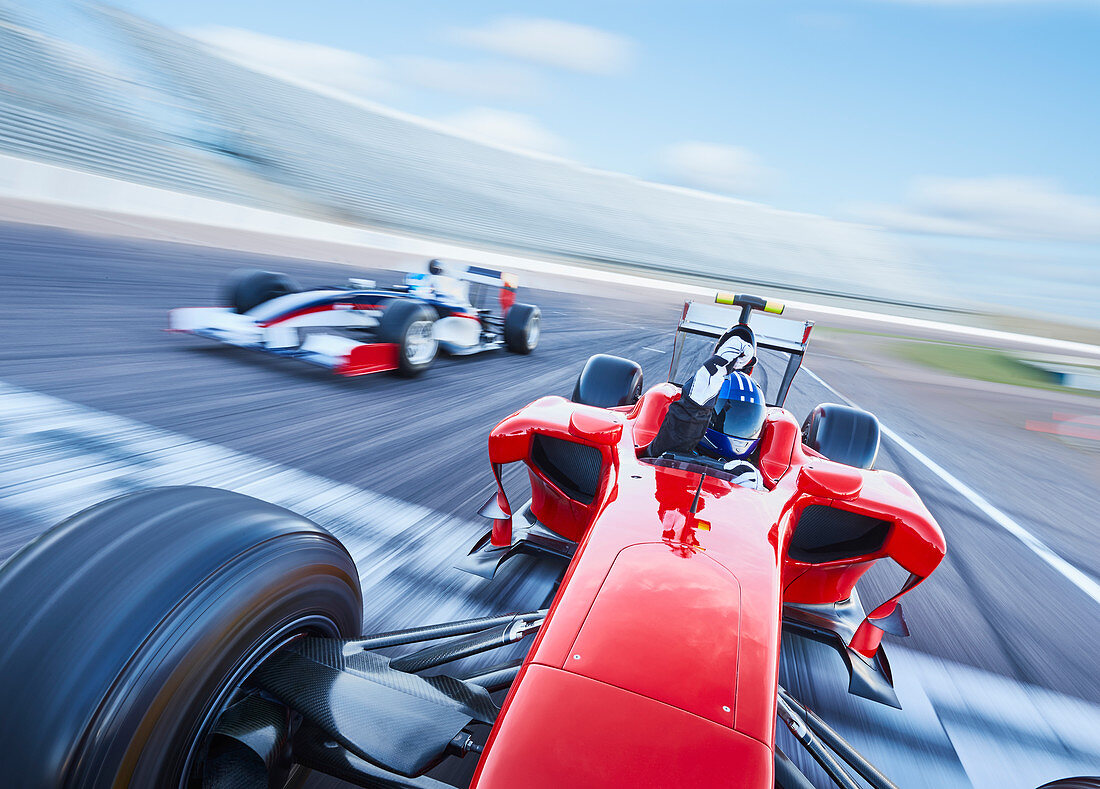 Formula one race car crossing finish line