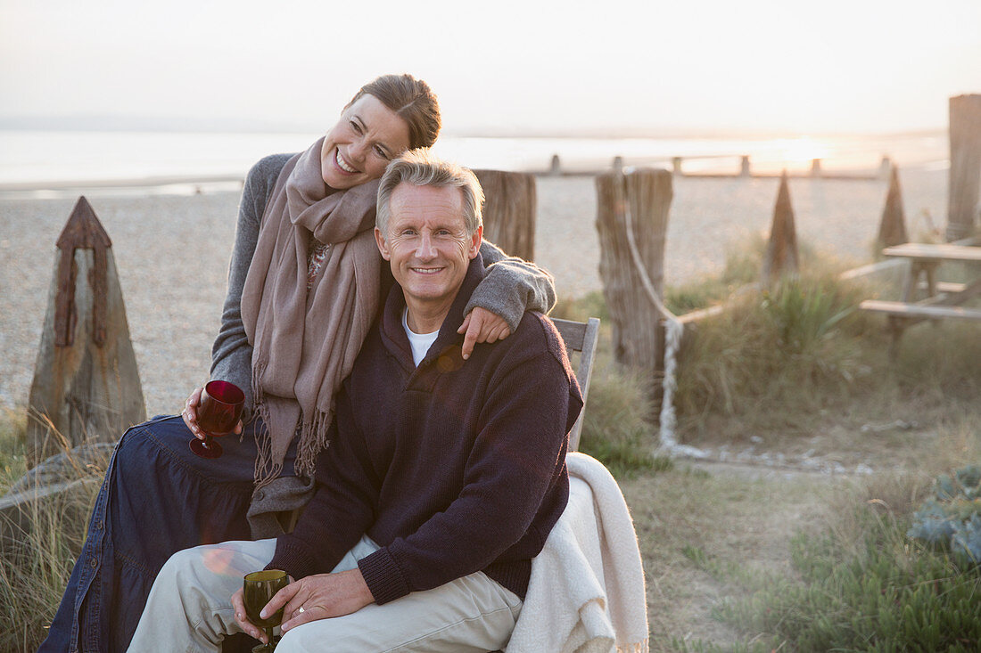 Portrait mature couple drinking wine