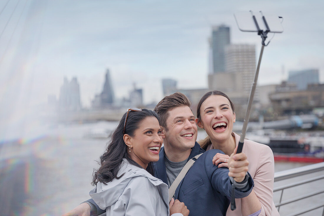 Tourists taking selfie, London, UK