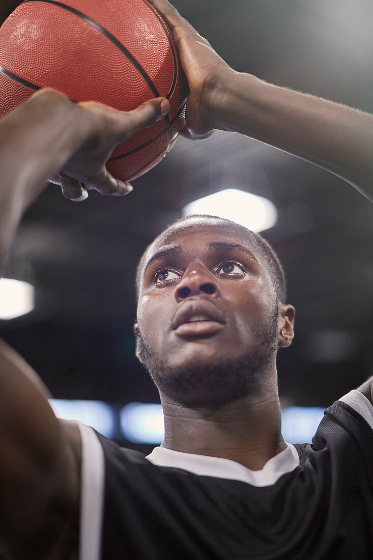 Close up basketball player shooting free throw