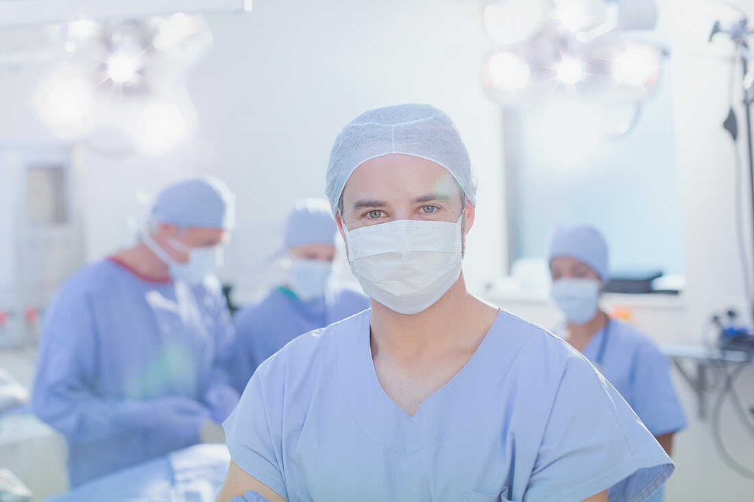 Portrait young male surgeon wearing surgical mask