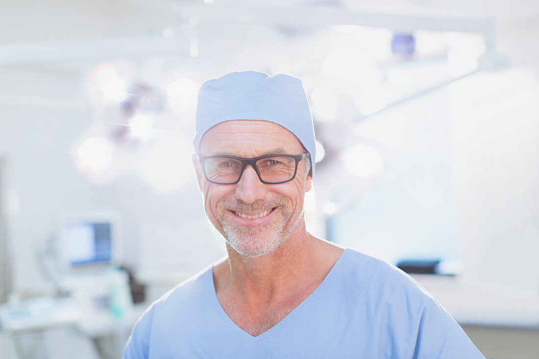 Portrait confident mature male surgeon