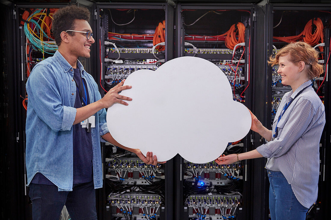IT technicians holding cloud , cloud computing