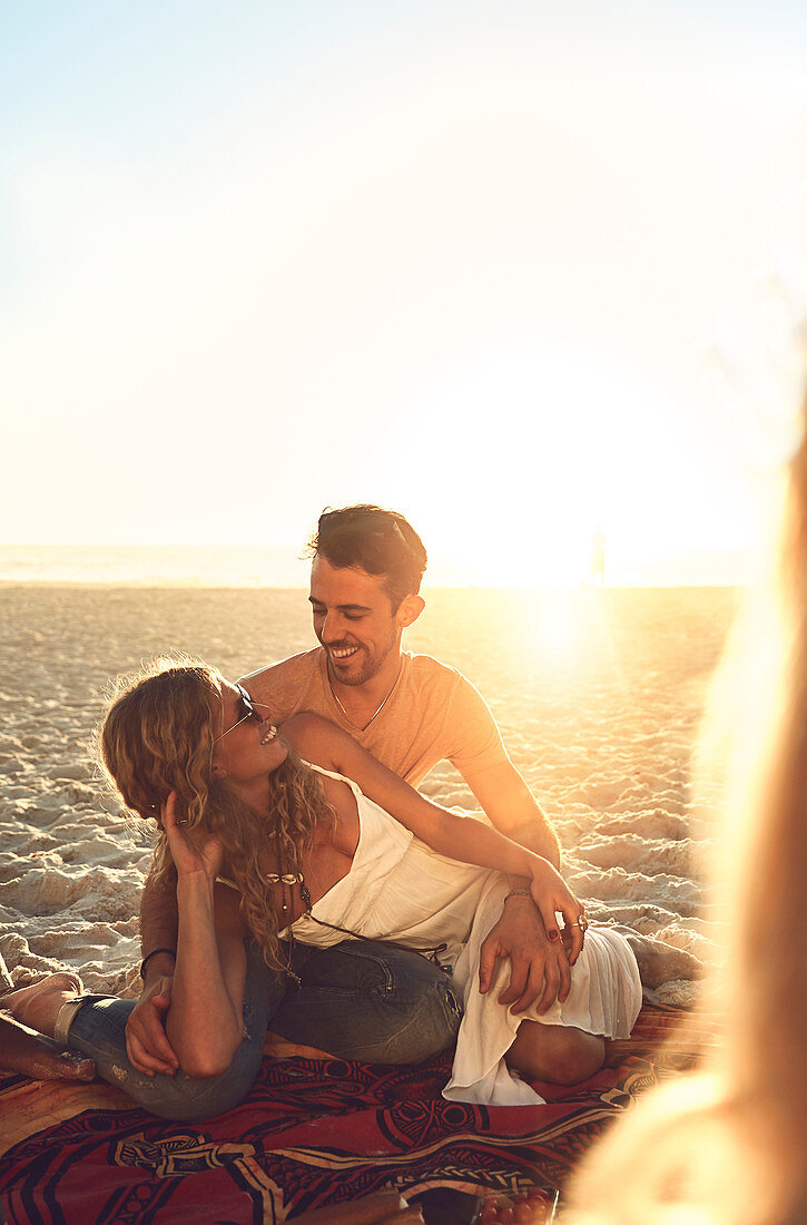 Affectionate young couple relaxing