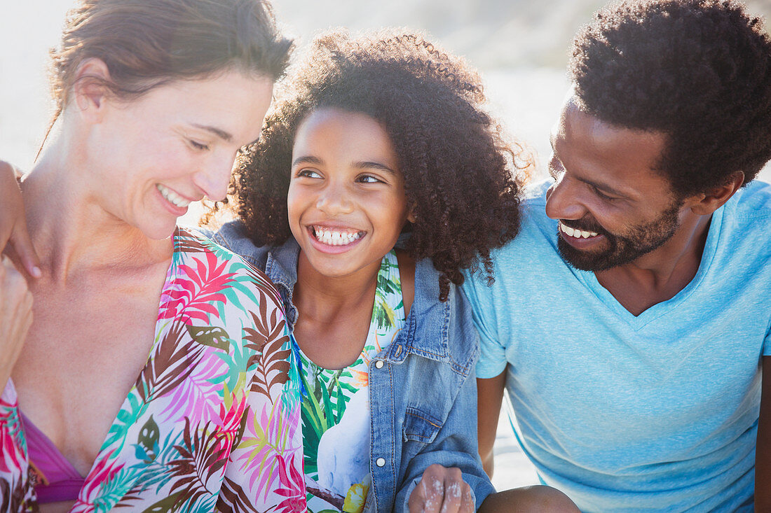 Smiling, affectionate multi-ethnic family