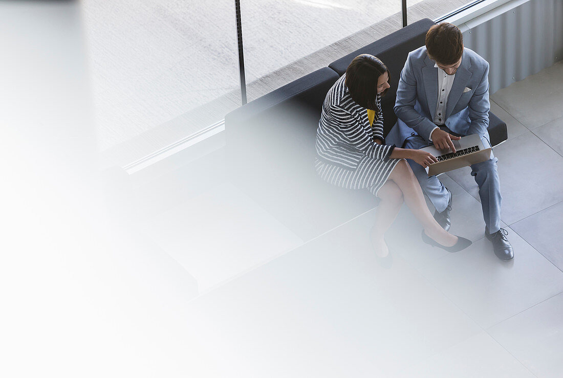 Businessman and businesswoman working