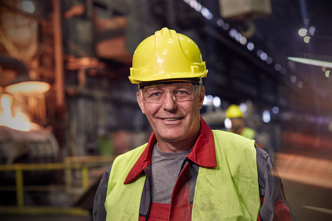 Portrait steelworker in steel mill