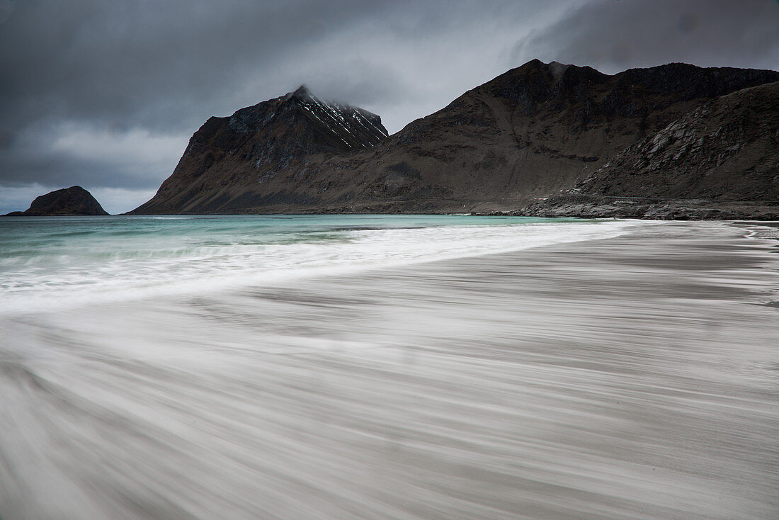 Blurred motion ocean beach tide, Norway