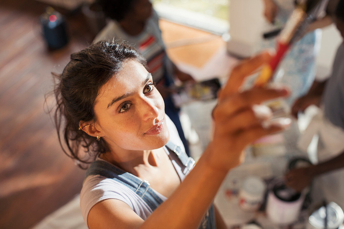 Young woman painting