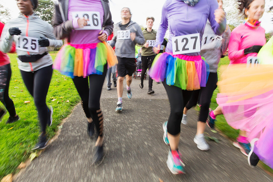 Charity run runners running in tutus