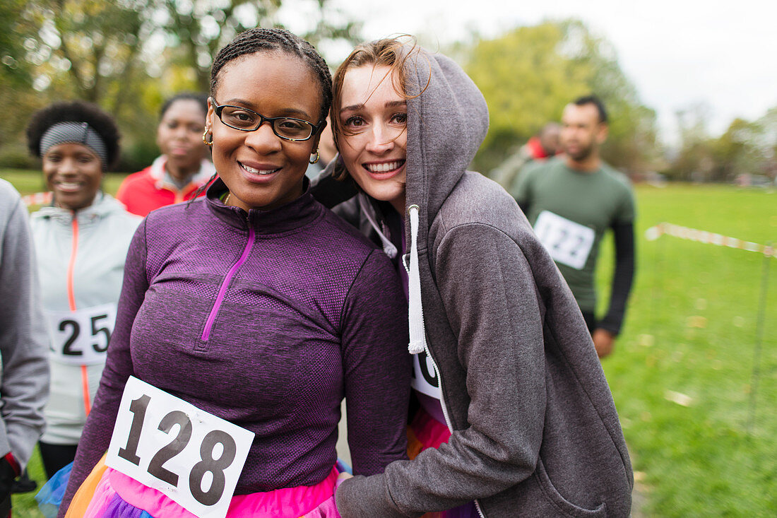 Portrait smiling, female runners