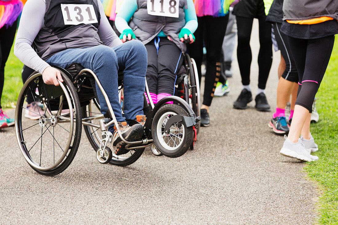 Woman in wheelchair at charity race