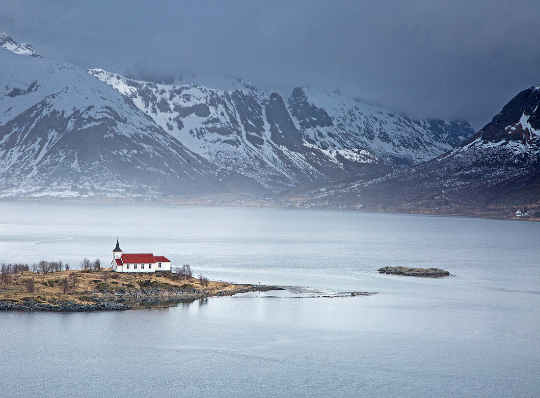Remote church along fjord waterfront, Norway