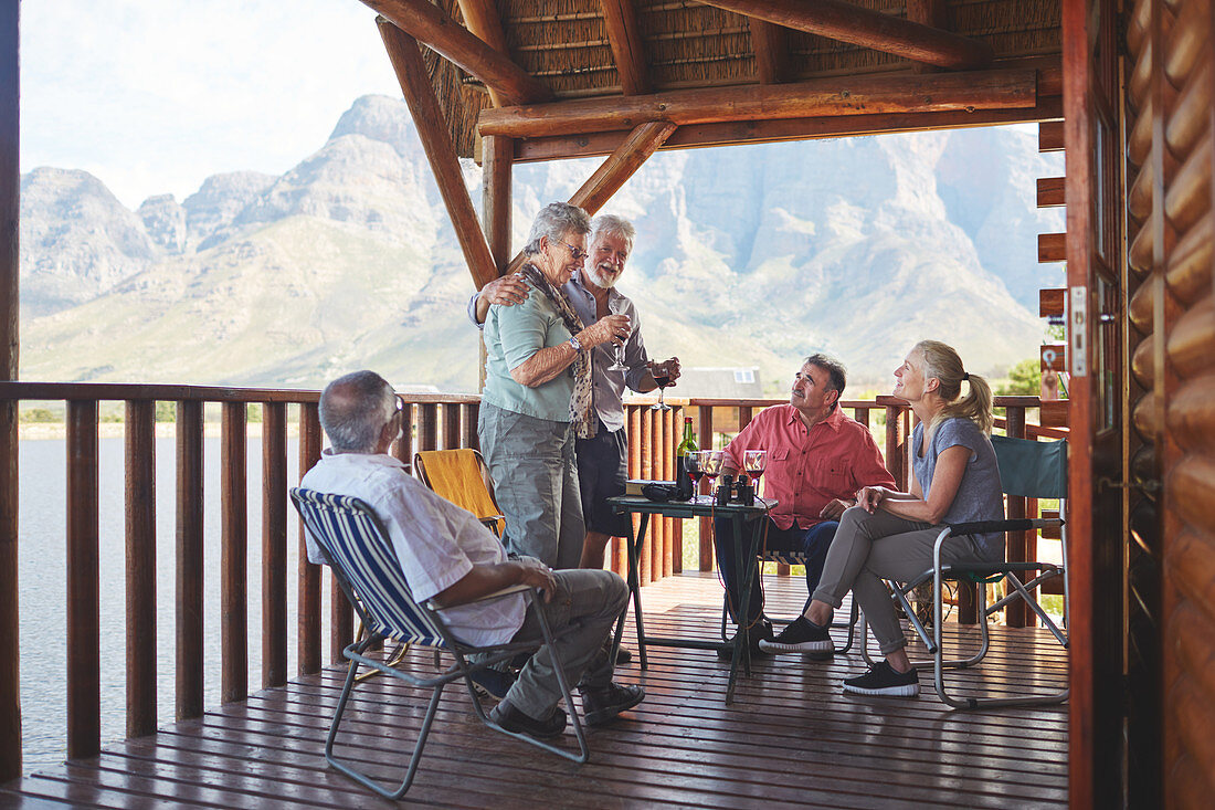 Active senior couple toasting