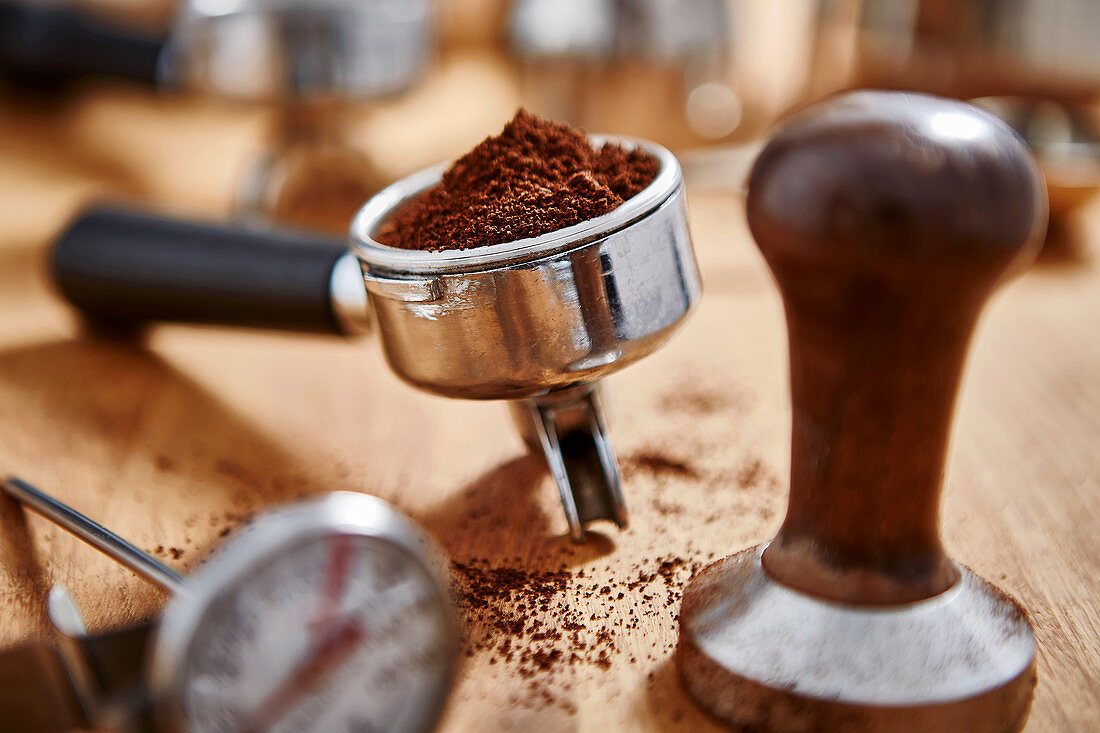 Espresso grounds and coffee tamper