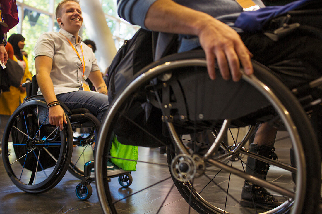 People arriving in wheelchairs