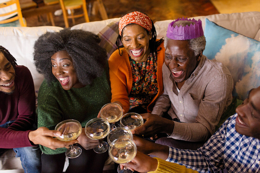 Family toasting champagne, celebrating Christmas